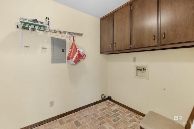 9215 Shiloh Dr, Mobile, AL 36695 - washroom with electric panel, cabinet space, brick flooring, and hookup for a washing machine