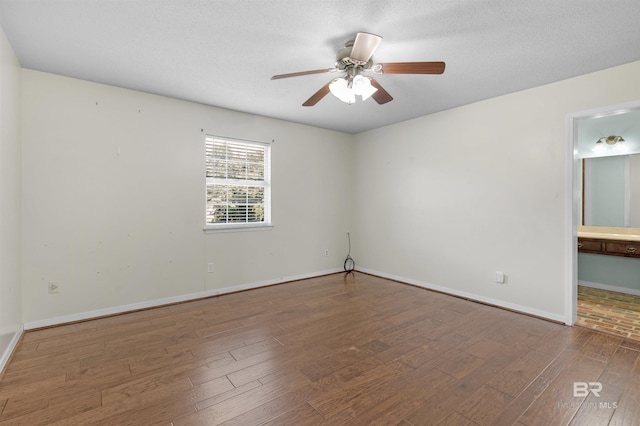 9215 Shiloh Dr, Mobile, AL 36695 - spare room with wood finished floors and a ceiling fan