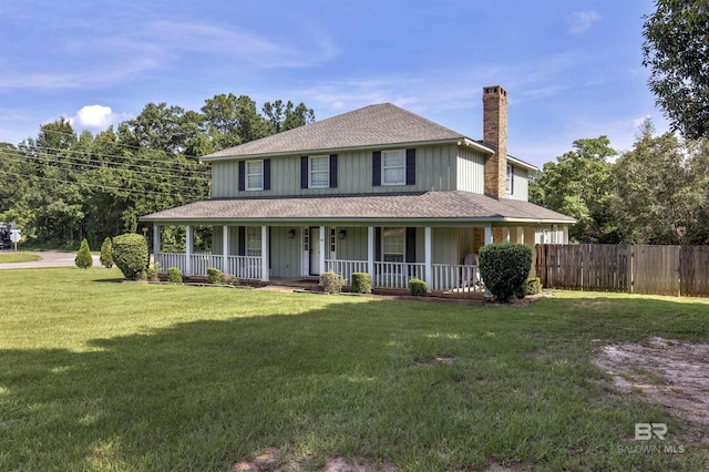 9215 Shiloh Dr, Mobile, AL 36695 - farmhouse inspired home featuring a chimney, covered porch, board and batten siding, and a shingled roof