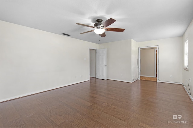 9215 Shiloh Dr, Mobile, AL 36695 - empty room featuring a ceiling fan and wood finished floors