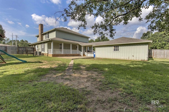 9215 Shiloh Dr, Mobile, AL 36695 - back of house with a chimney and a playground