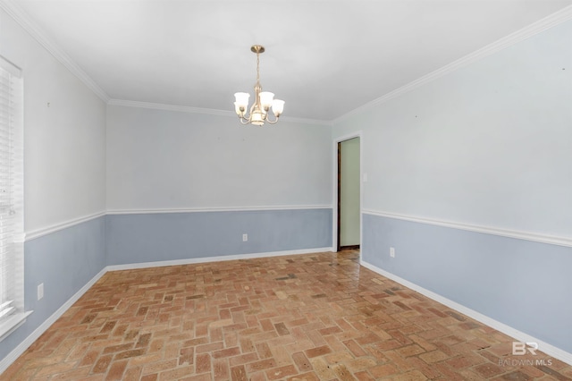 9215 Shiloh Dr, Mobile, AL 36695 - spare room with a chandelier, brick floors, and crown molding