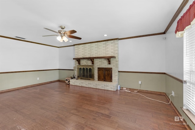 9215 Shiloh Dr, Mobile, AL 36695 - unfurnished living room with ceiling fan, wood finished floors, crown molding, a brick fireplace, and recessed lighting