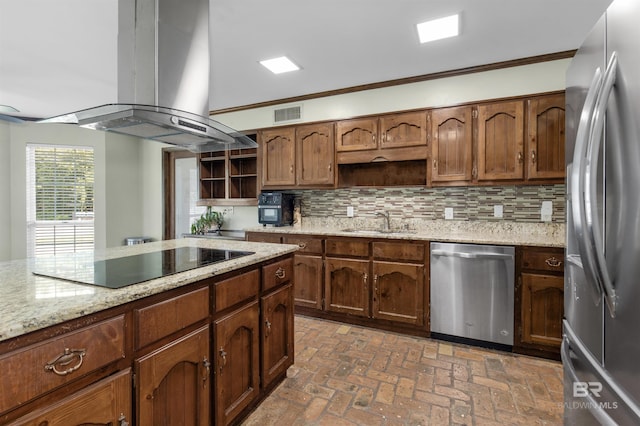9215 Shiloh Dr, Mobile, AL 36695 - kitchen with appliances with stainless steel finishes, open shelves, island exhaust hood, decorative backsplash, and crown molding