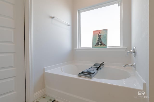 full bath featuring a bath