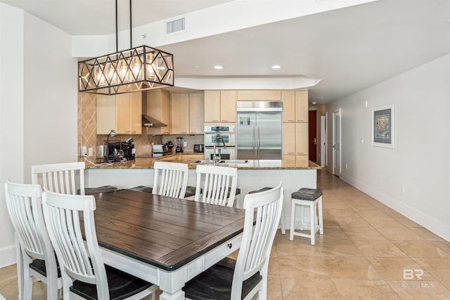 dining area with recessed lighting, visible vents, baseboards, and light tile patterned floors