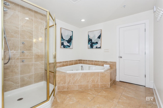 full bath featuring a garden tub and a shower stall