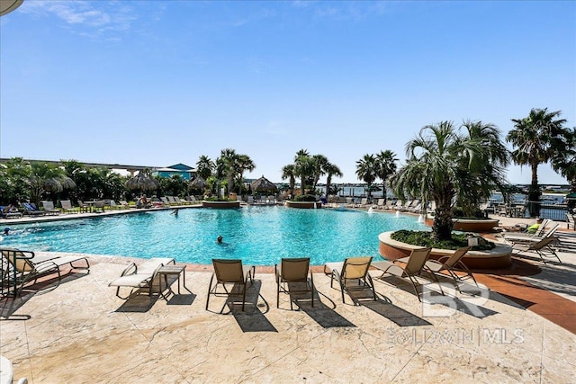 community pool with a patio