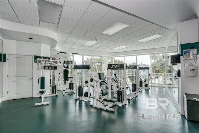 exercise room with a drop ceiling