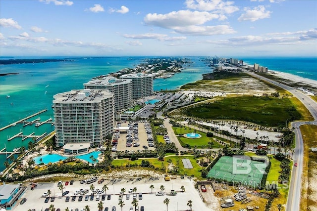 drone / aerial view featuring a water view and a city view