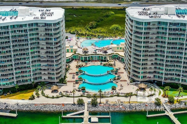 drone / aerial view with a water view and a city view