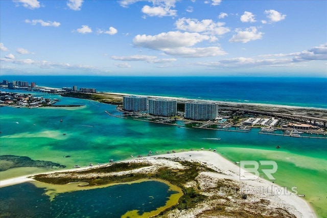 birds eye view of property featuring a view of city and a water view