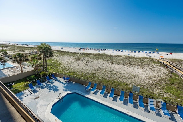 exterior space with a beach view