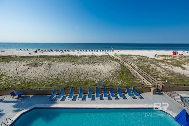 view of water feature featuring a beach view