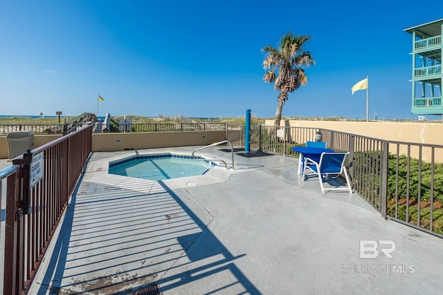 view of pool featuring a patio area