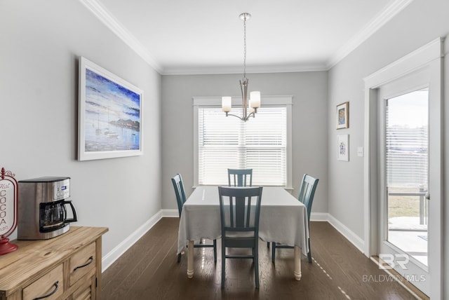 dining area with ornamental molding, dark hardwood / wood-style floors, and a healthy amount of sunlight