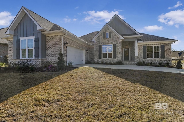 craftsman-style home featuring a garage and a front lawn