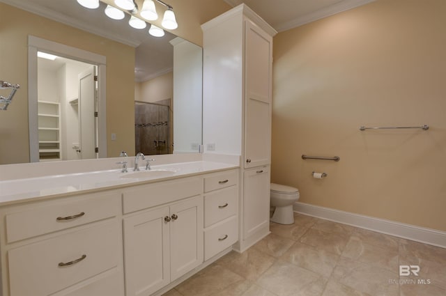 bathroom featuring toilet, baseboards, a spacious closet, a tile shower, and crown molding