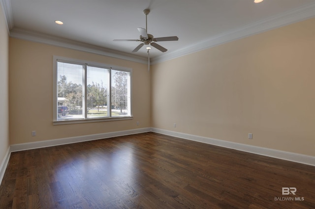 unfurnished room with baseboards, dark wood-style flooring, and crown molding