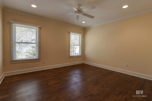 spare room featuring baseboards, dark wood-type flooring, recessed lighting, and crown molding