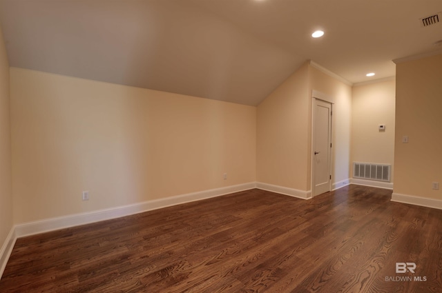 bonus room featuring dark wood-style floors, baseboards, visible vents, and recessed lighting