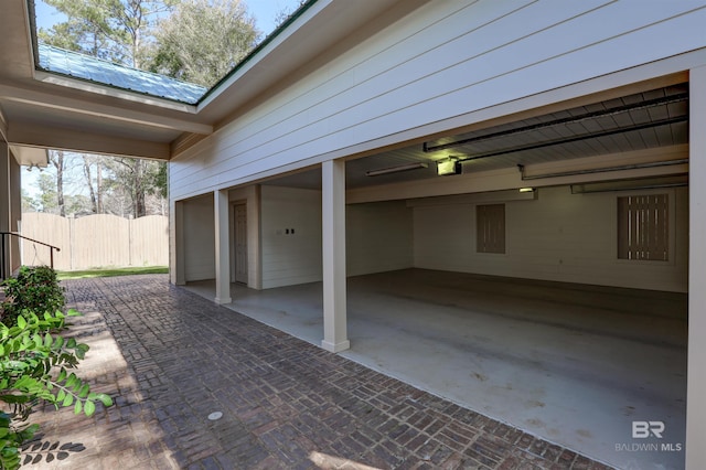 garage featuring fence