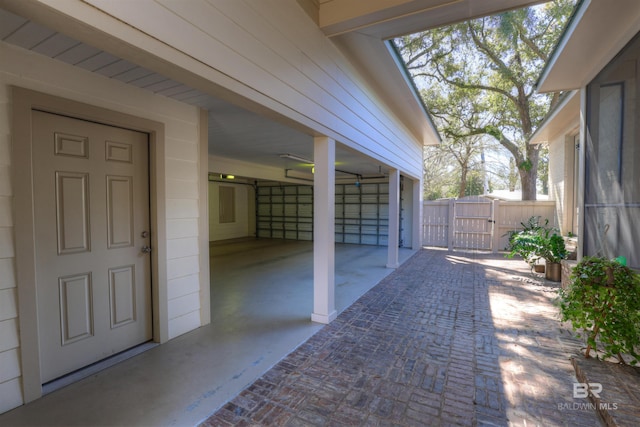 view of patio / terrace with a gate and fence