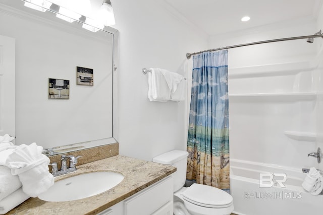 full bathroom featuring vanity, ornamental molding, toilet, and shower / bath combo with shower curtain