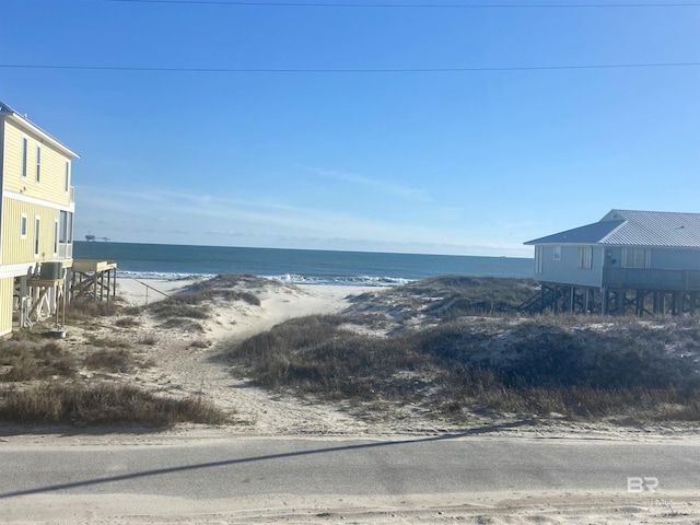 water view featuring a beach view