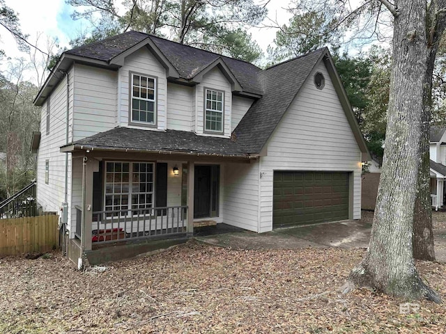 view of front of home with a garage and covered porch