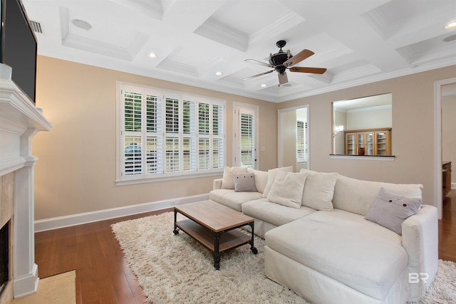 living room with ornamental molding, coffered ceiling, ceiling fan, and light hardwood / wood-style flooring