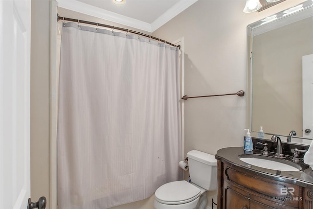 bathroom featuring vanity, crown molding, and toilet