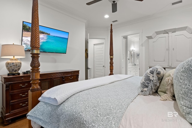 bedroom featuring recessed lighting, ornamental molding, visible vents, ensuite bathroom, and wood finished floors