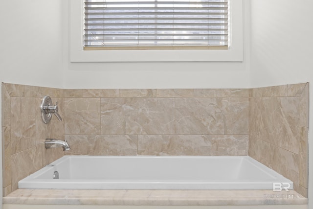 full bath with a tub to relax in
