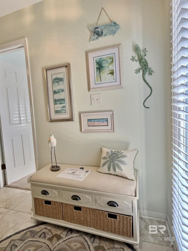 interior space with plenty of natural light and tile patterned flooring