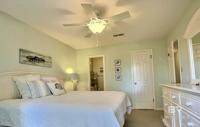 carpeted bedroom with ceiling fan and visible vents