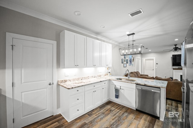 kitchen with open floor plan, dark wood-type flooring, a sink, visible vents, and dishwasher