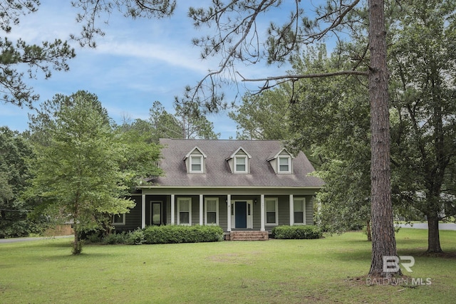 cape cod house featuring a porch and a front yard