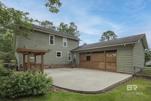 rear view of property with a patio and central air condition unit