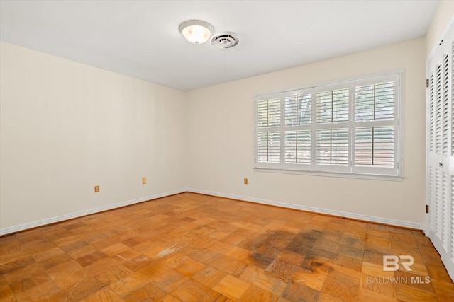 empty room with parquet floors