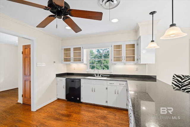 kitchen featuring sink, hanging light fixtures, ceiling fan, black dishwasher, and white cabinetry