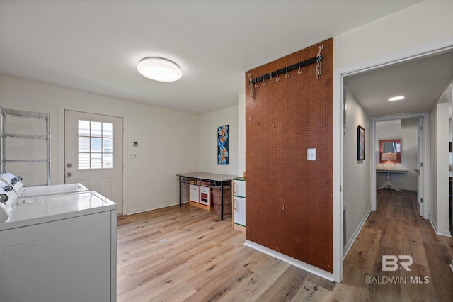 211 Fels Ave, Fairhope, AL 36532 - clothes washing area with baseboards, laundry area, light wood finished floors, and washer and dryer
