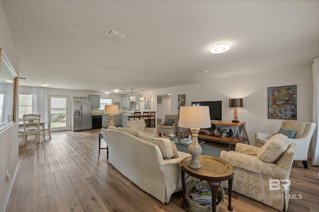 211 Fels Ave, Fairhope, AL 36532 - living room with baseboards and wood finished floors