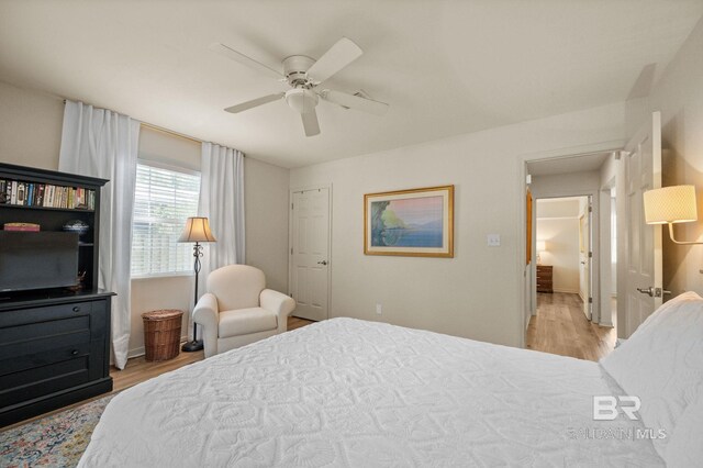 211 Fels Ave, Fairhope, AL 36532 - bedroom with a ceiling fan, baseboards, and wood finished floors
