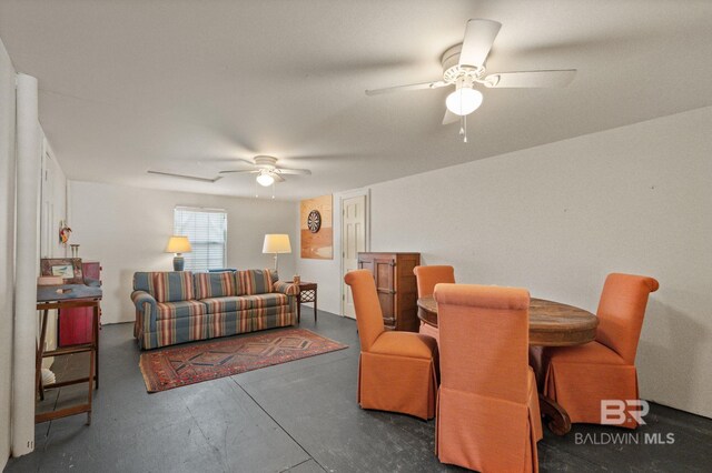 211 Fels Ave, Fairhope, AL 36532 - dining area featuring a ceiling fan and concrete floors