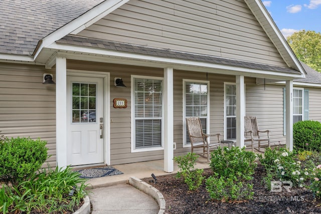 211 Fels Ave, Fairhope, AL 36532 - entrance to property featuring a shingled roof and covered porch
