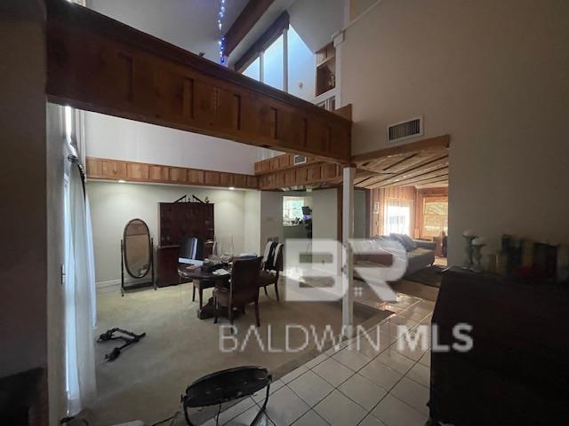114 Dewitt Cir, Daphne, AL 36526 - tiled bedroom featuring visible vents and a high ceiling