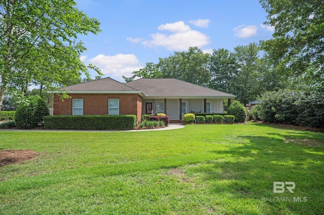 16520 Gaineswood Dr, Fairhope, AL 36532 - single story home featuring a front yard, brick siding, and a porch