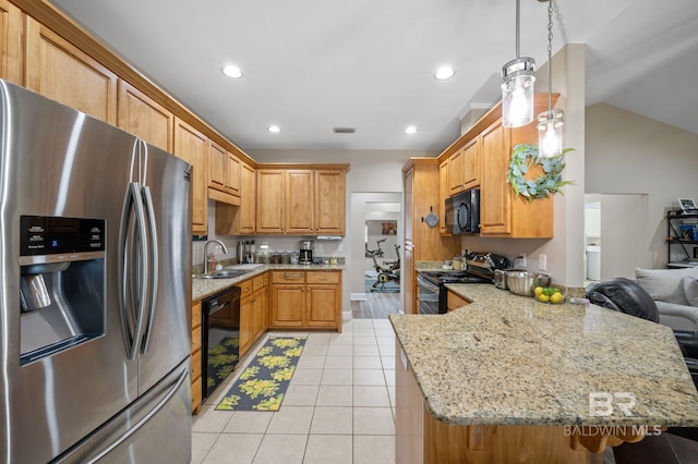 16520 Gaineswood Dr, Fairhope, AL 36532 - kitchen featuring black appliances, a sink, light tile patterned floors, a peninsula, and light stone counters