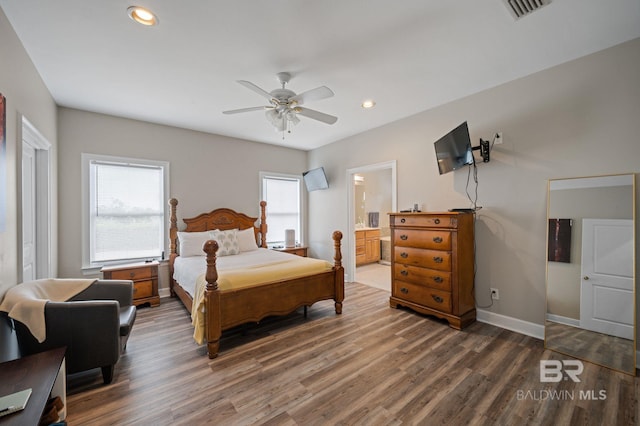 16520 Gaineswood Dr, Fairhope, AL 36532 - bedroom with wood finished floors, baseboards, recessed lighting, ensuite bathroom, and ceiling fan